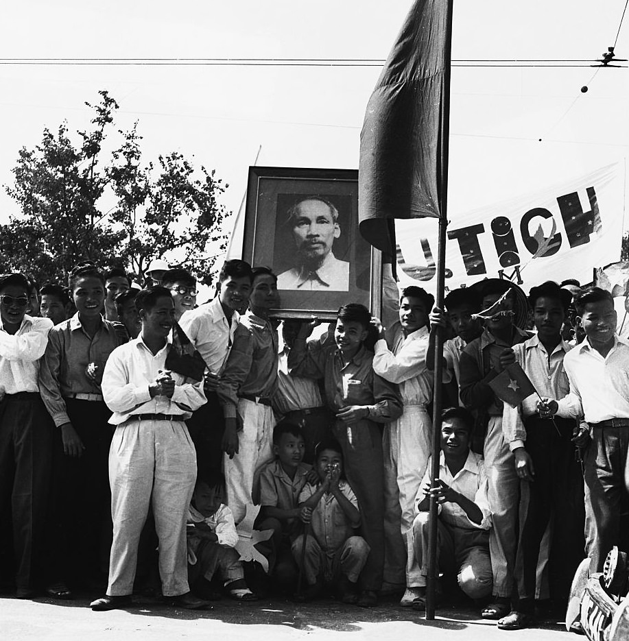 A group of young men bear a portrait of Ho Chi Minh, 1960.