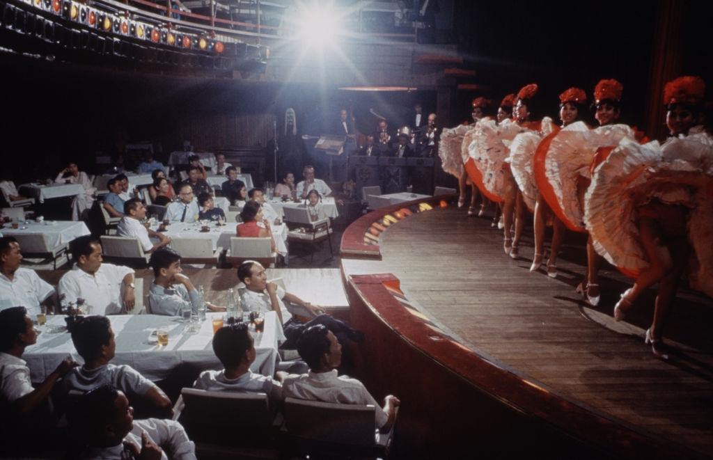 Audience watching a theater dance performance, Vietnam, April 1969.