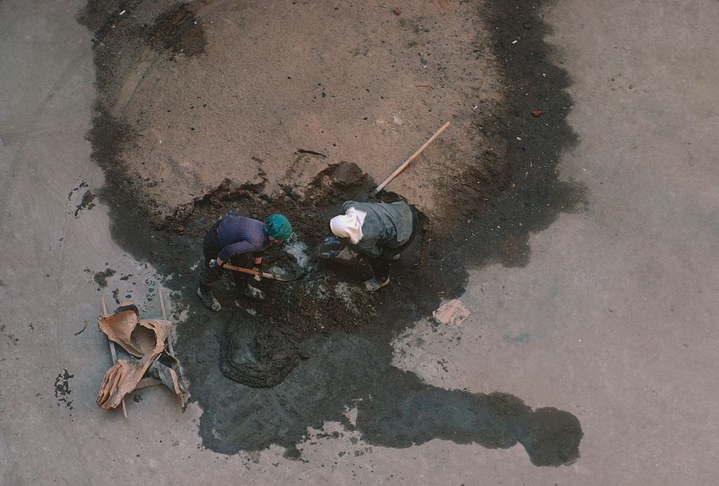 Two women repairing a road in Leningrad, May 1972.