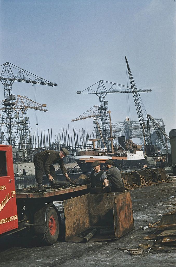 Workers on a lorry at the Harland & Wolff shipyard in Belfast, 1955