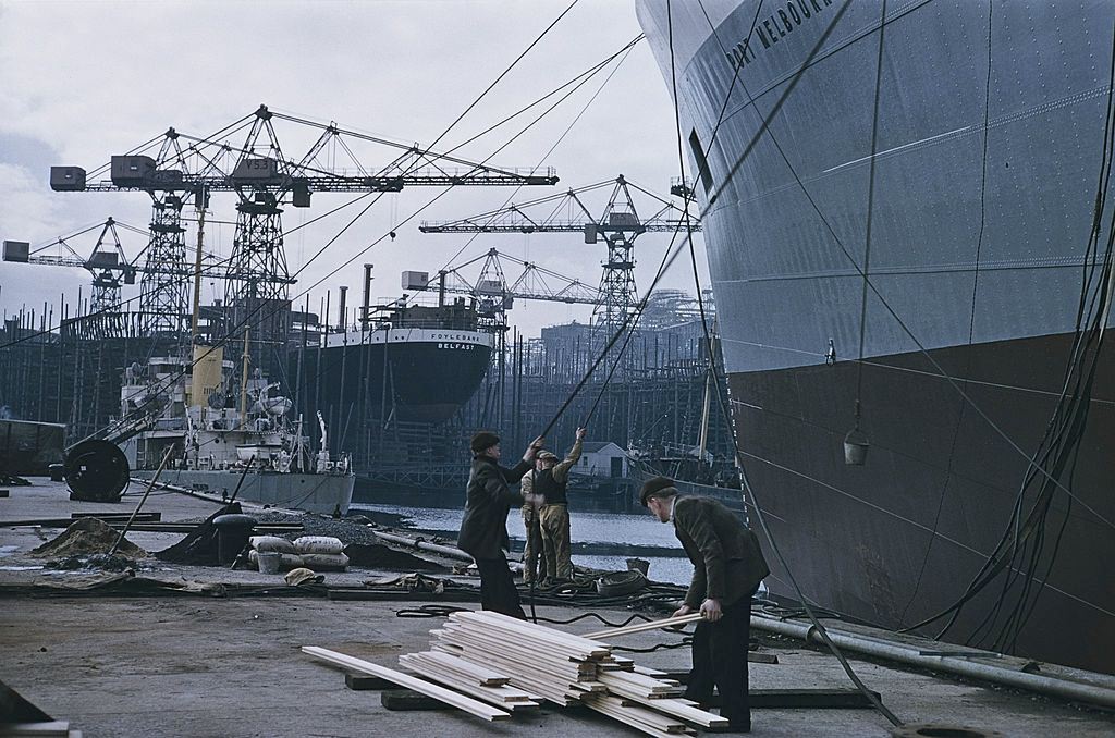 The cargo ship Port Melbourne (right) under construction at the Harland & Wolff shipyard in Belfast, 1955.