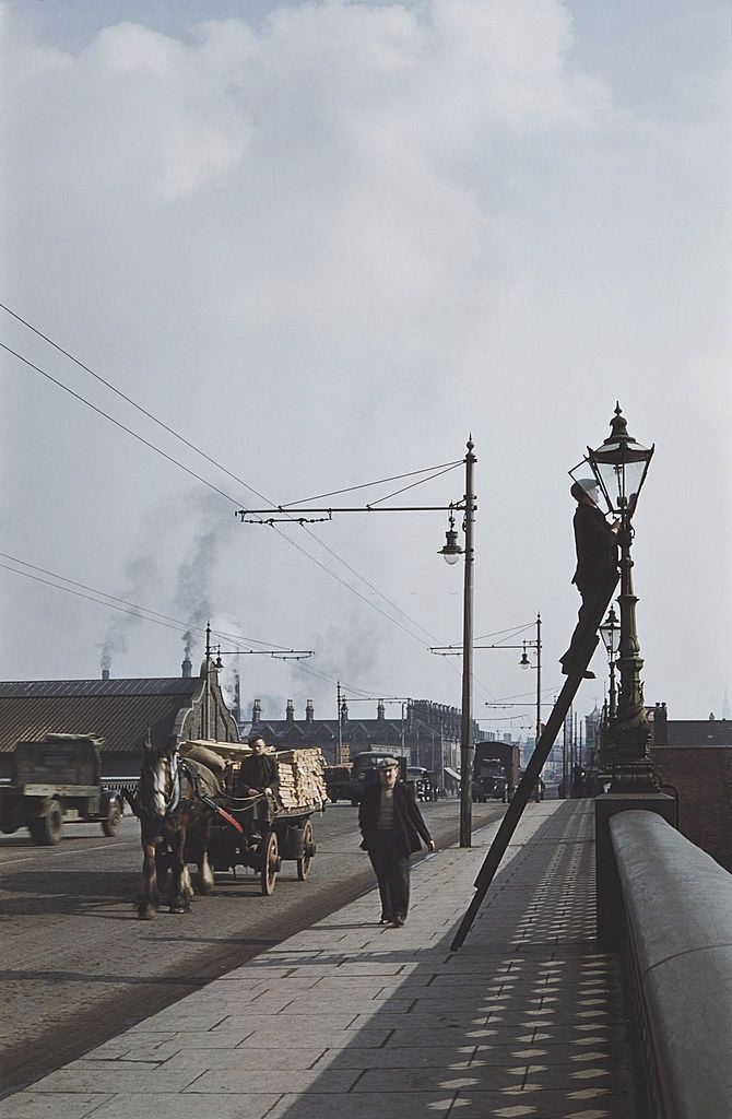 A horsedrawn cart crossing a bridge in Belfast, 1955.
