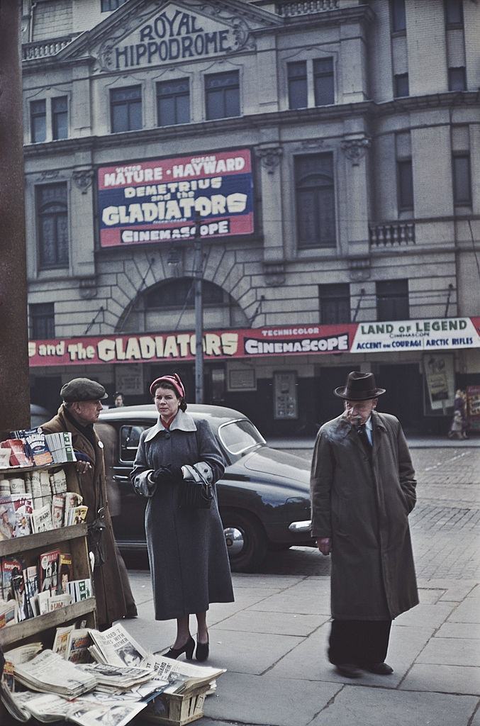 Customers at a news stand opposite the Royal Hippodrome cinema, Victoria Street, Belfast, 1955.