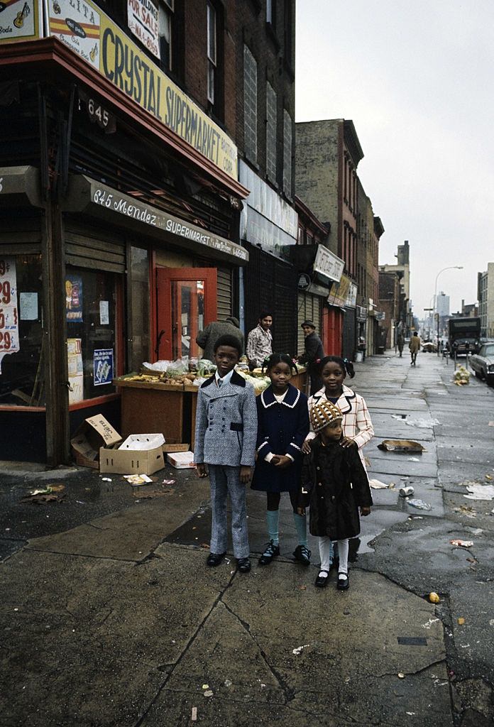 Fourchildren in their Sunday best, Brooklyn, 1973.