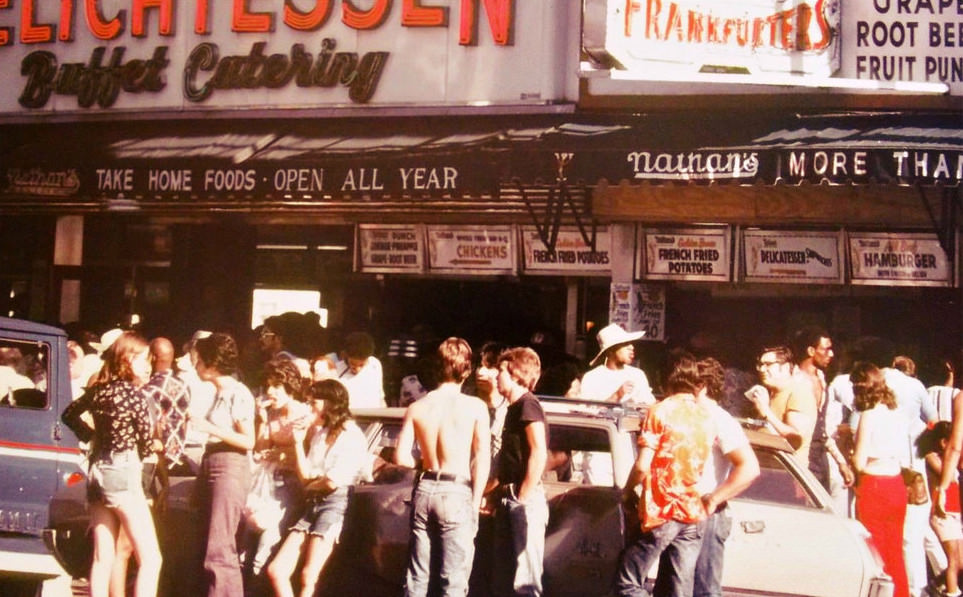 Street scene outside Nathan's, Coney Island, 1973