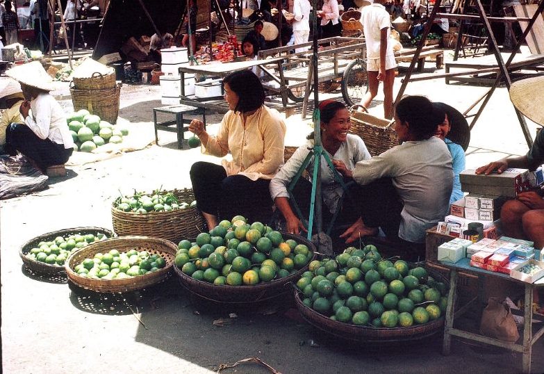 Ladies at the Can Tho market in Can Tho, 1968