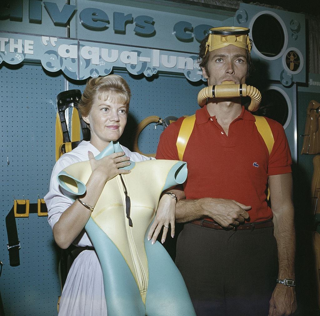 Clint Eastwood with his wife Maggie Johnson shopping for scuba diving equipment, 1960.