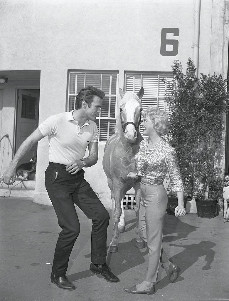 Clint Eastwood dances with television actress Connie Hines as horse Bamboo Harvester, 1962.