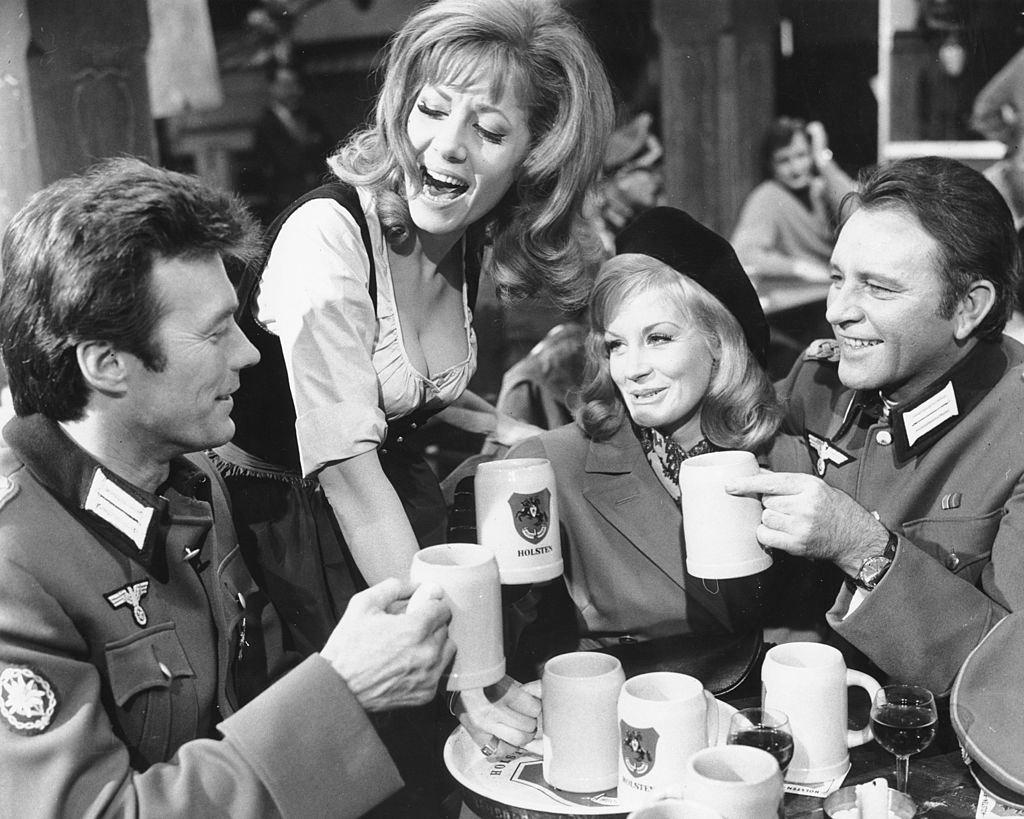 Clint Eastwood with Ingrid Pitt, Mary Ure, and Richard Burton, in a scene from 'Where Eagles Dare', 1967.