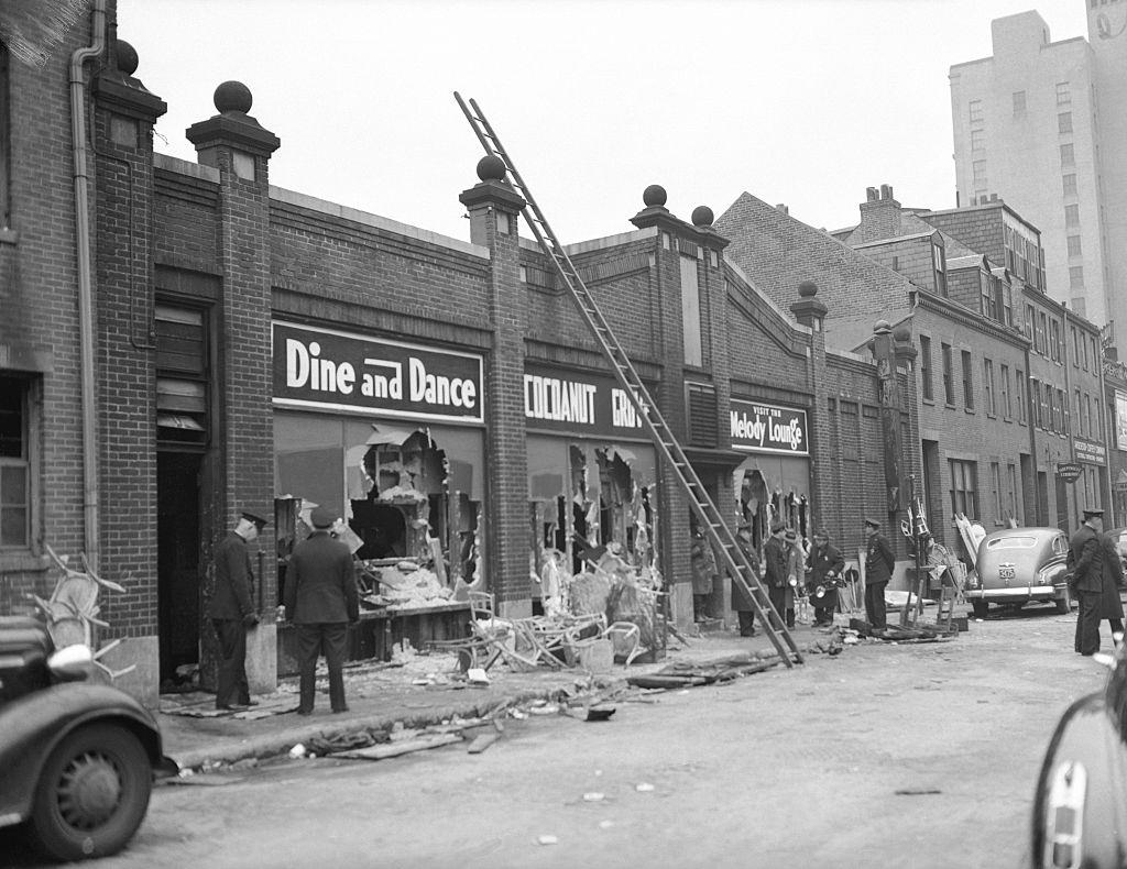 Broken windows of Cocoanut Grove Night Club after fire.