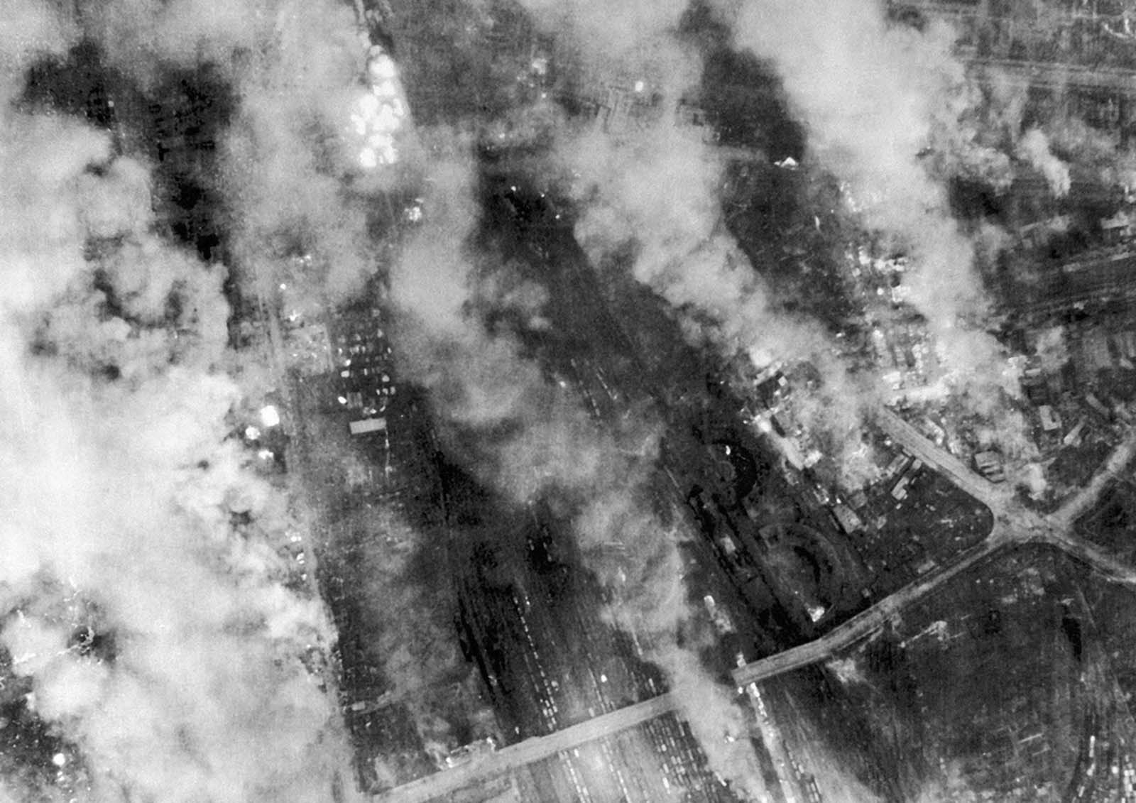 The smoke from fires still burning drifted across Dresden on February 14, 1945.