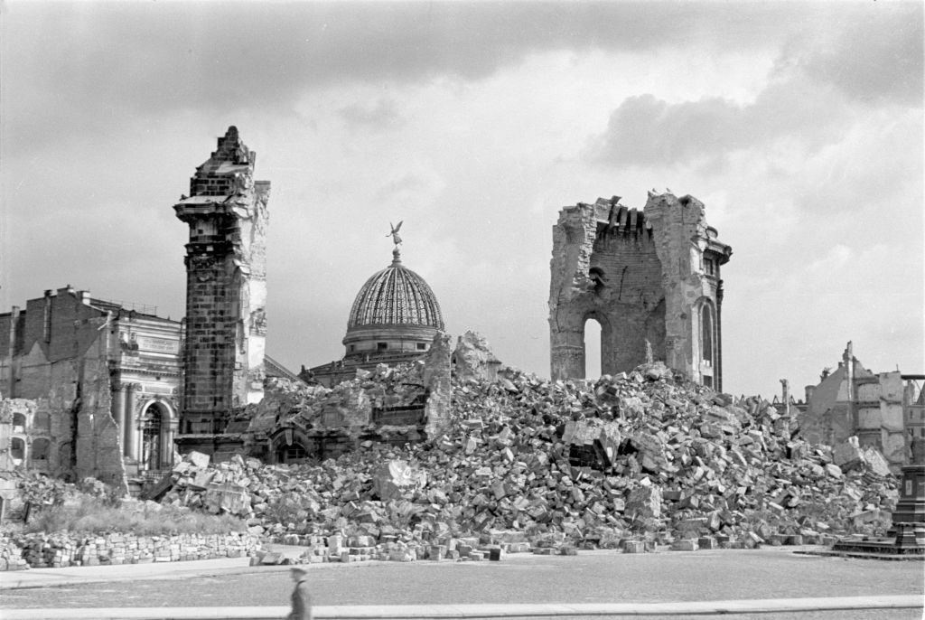 Ruins of the Dresden Frauenkirche. In the background is the dome of the Dresden Academy of Fine Arts, 1945.