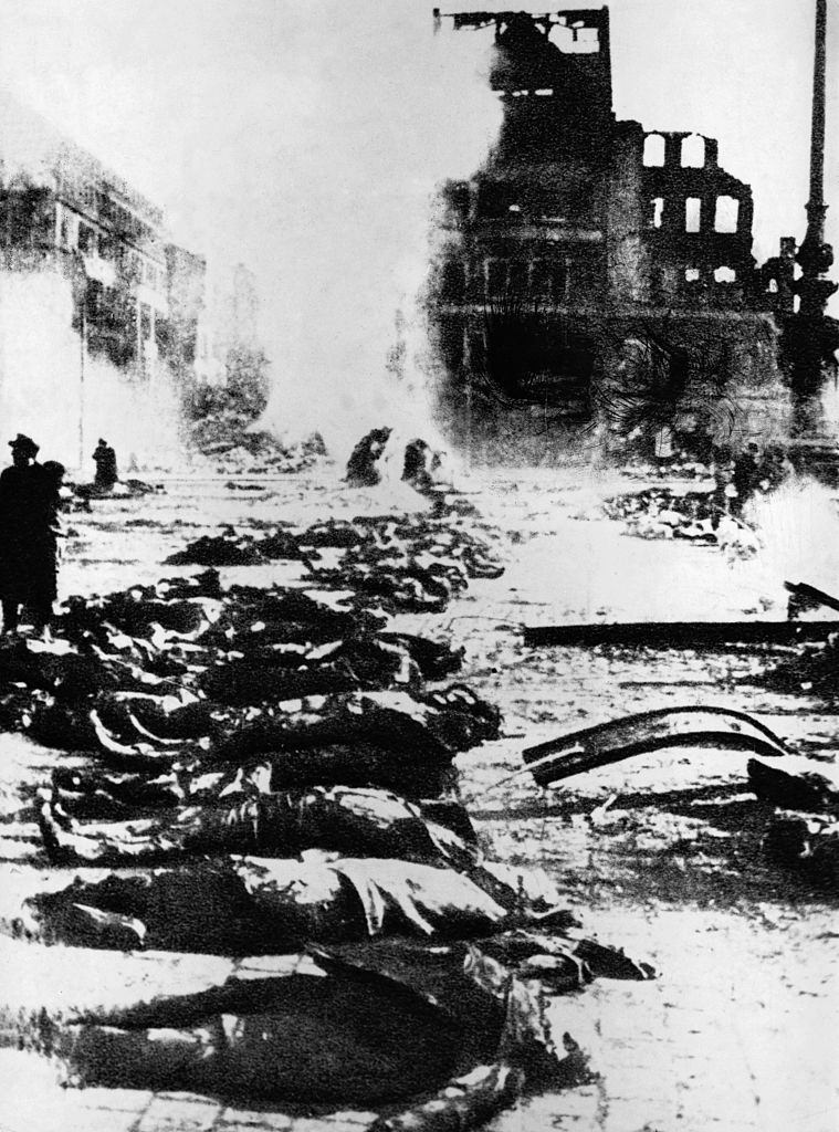 Dead bodies lie in a street in Dresden after a bombing raid on the city.