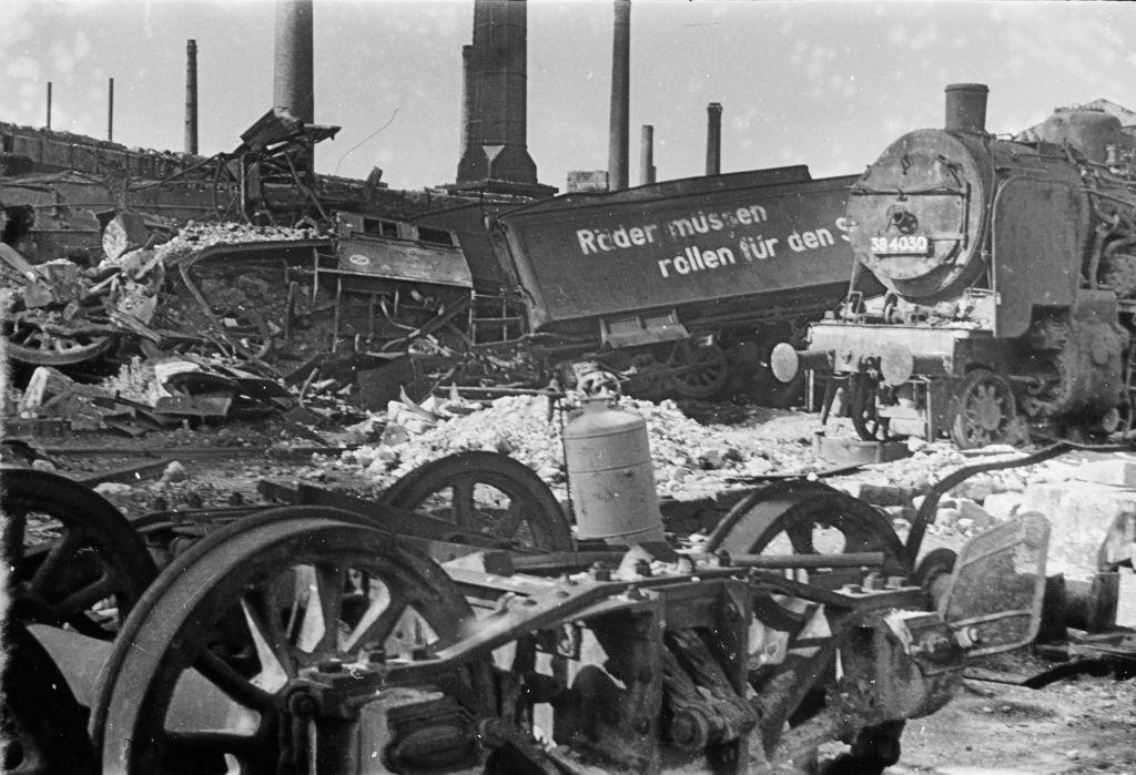 The terrain of the Deutsche Reichsbahn in Dresden with destroyed locomotives and track installations, 1945.