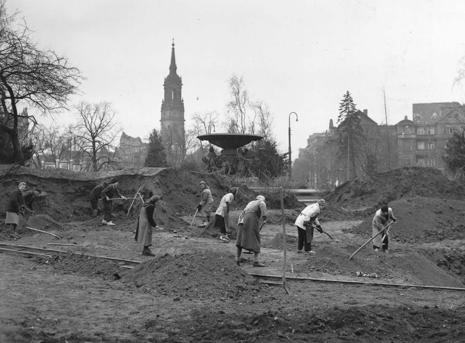 Volunteers spend a Sunday morning clearing rubble, 1946.