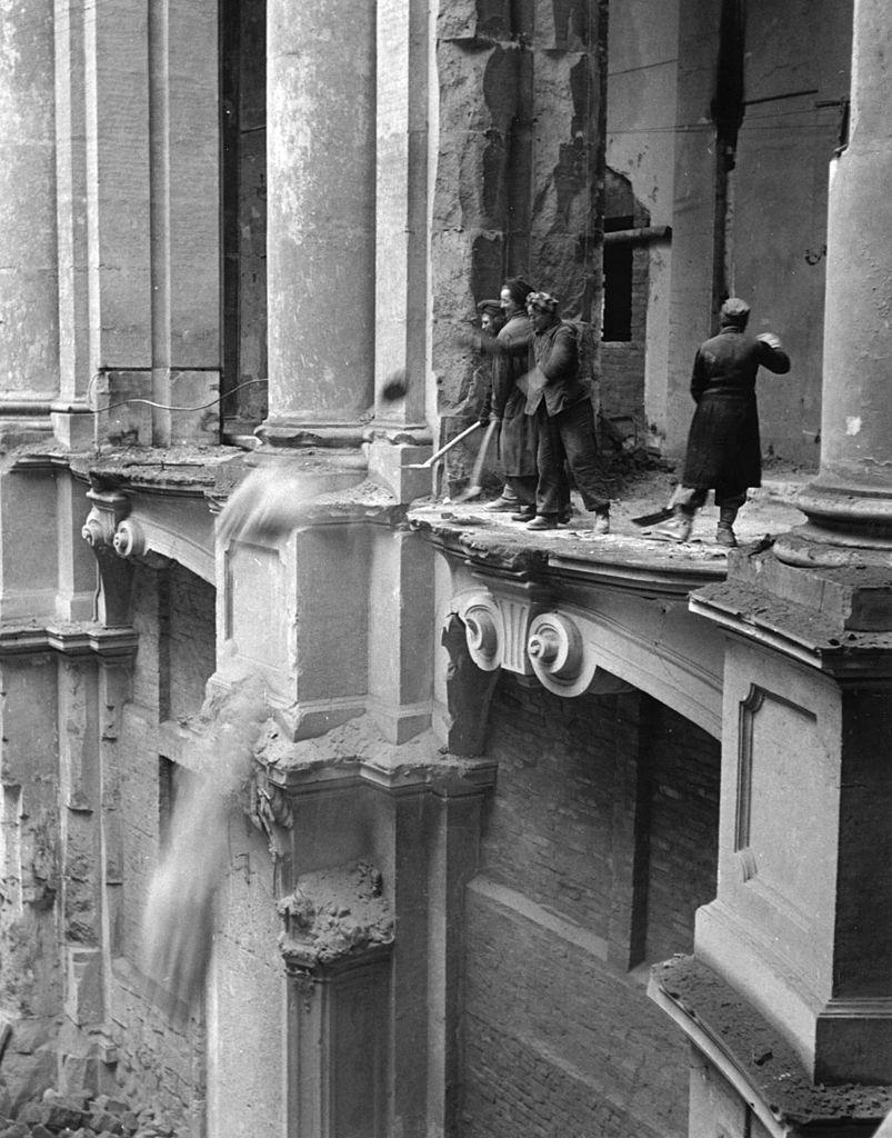 The women of Dresden clearing debris from the floor of the Zwinger art gallery.