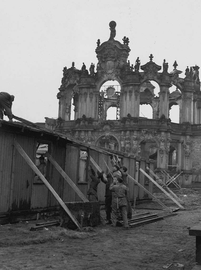 A shed is erected for the Clerk of the Works, who will supervise the reconstruction of the famous Zwinger Art Gallery.
