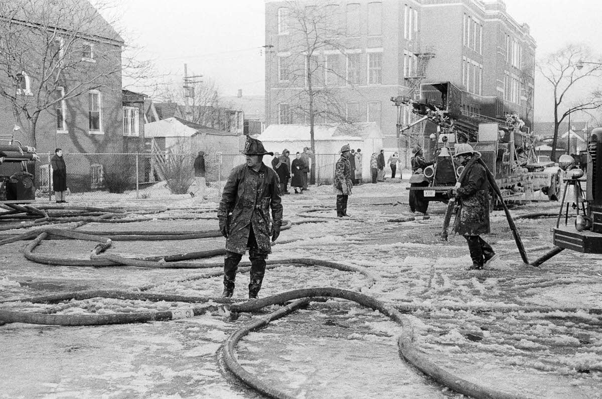 Chicago firefighters respond to a fire in sub-freezing temperatures, 1958.