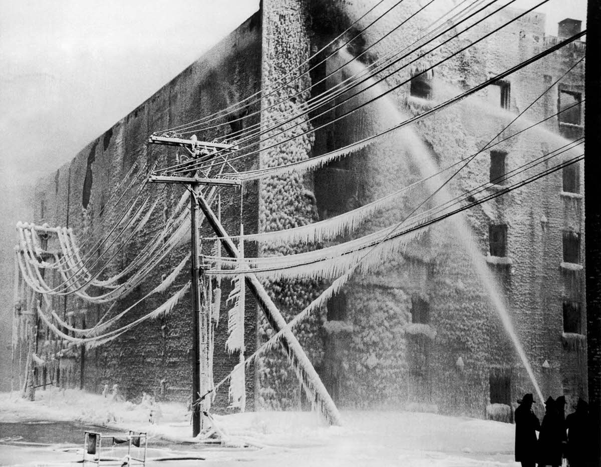 Firefighters battle a blaze in Albany, New York, 1940.