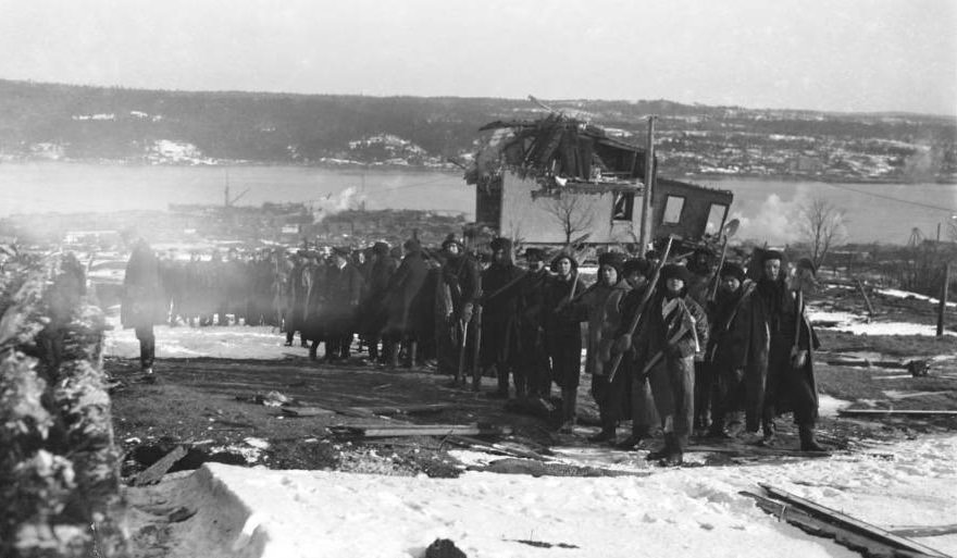 Workers prepare to rebuild their city.