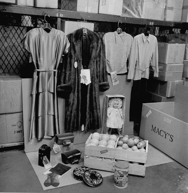 Employees in the Shopping Service department assembling an order for a customer.