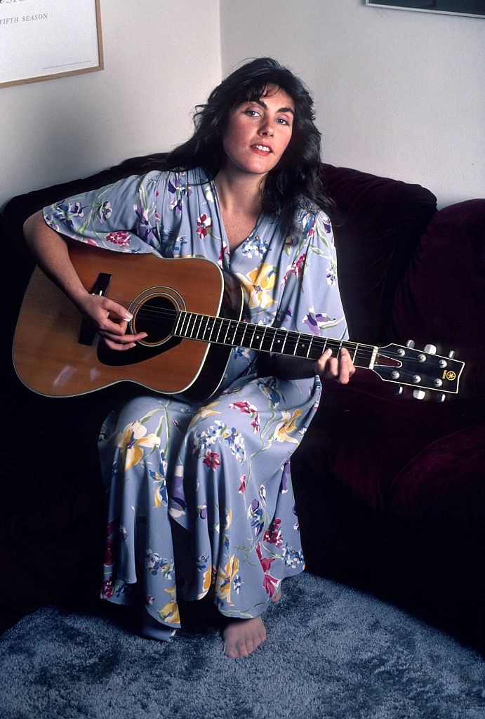 Laura Branigan playing guitar, 1982.