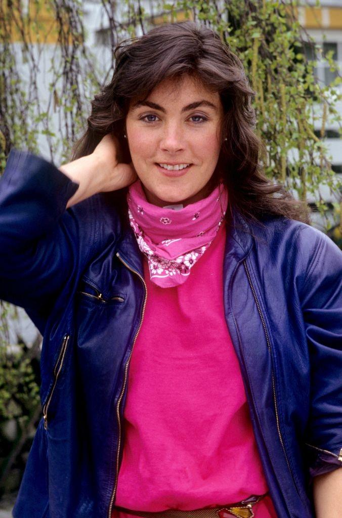 Laura Branigan wearing blue jacket, 1984.