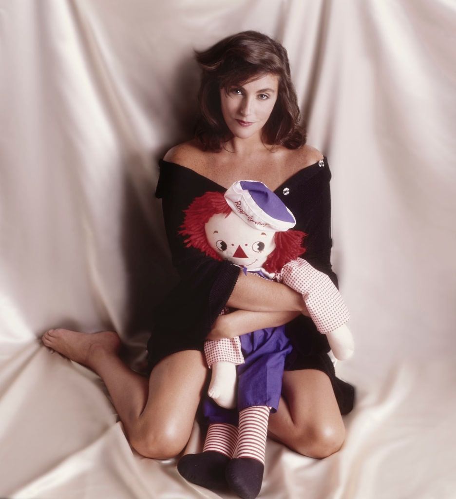 Laura Branigan with a doll, 1985.