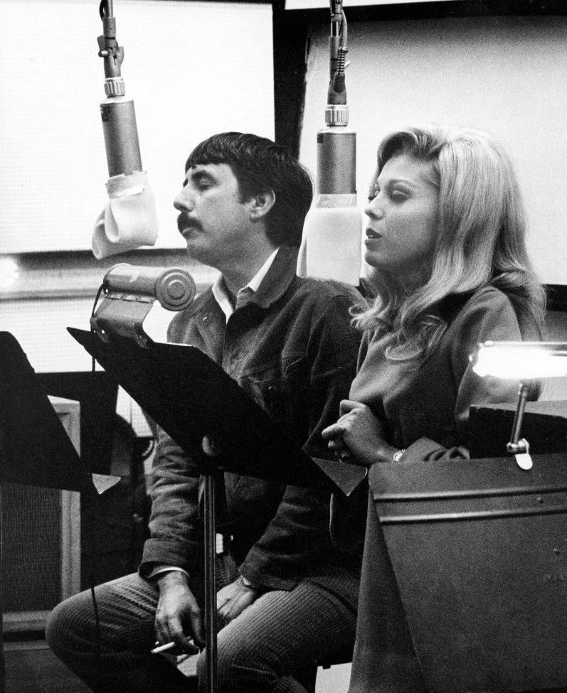 Nancy Sinatra with songwriter and record producer Lee Hazlewood recording in the studio, 1966.