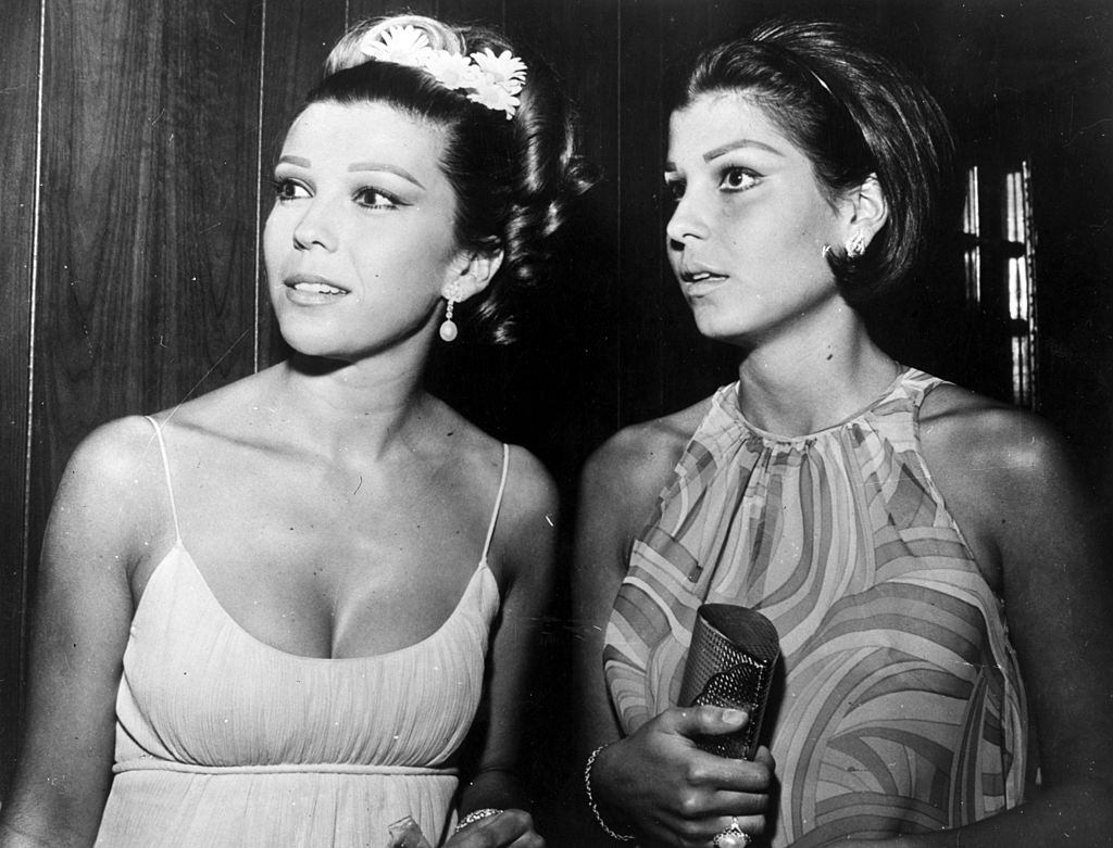 Nancy Sinatra with Tina Sinatra attend the wedding reception of film producer Arthur Loew and Regina Groves at Hollywood club, 1966.
