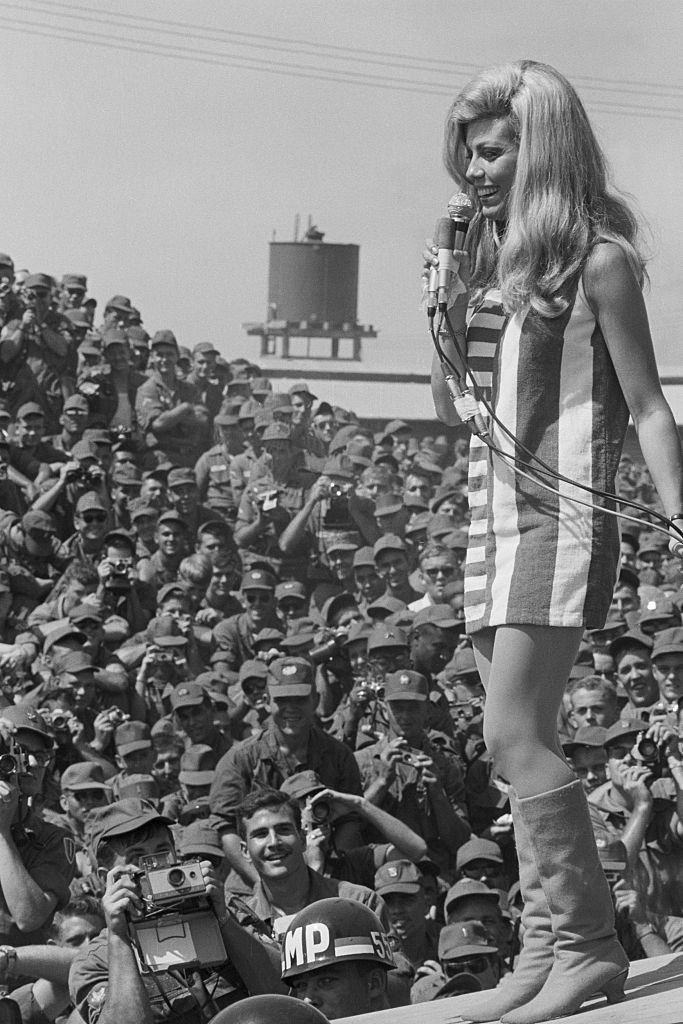 Nancy Sinatra performs for members of the First Infantry Division in Bien Hoa, South Vietnam, 1967.