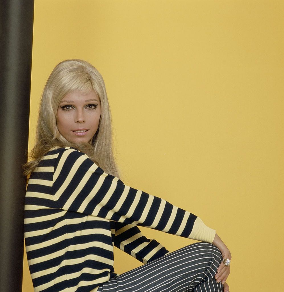 Nancy Sinatra posted for the cover of her album, 1967.