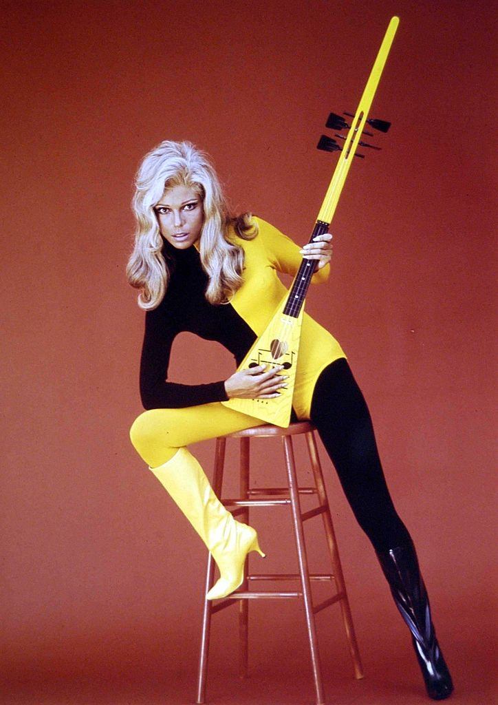 Nancy Sinatra with a guitar, 1968.