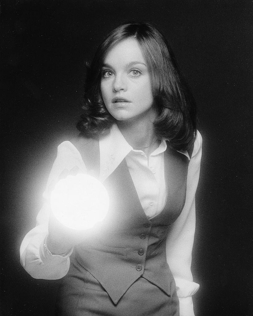 Pamela Sue Martin holding a torch, 1977.