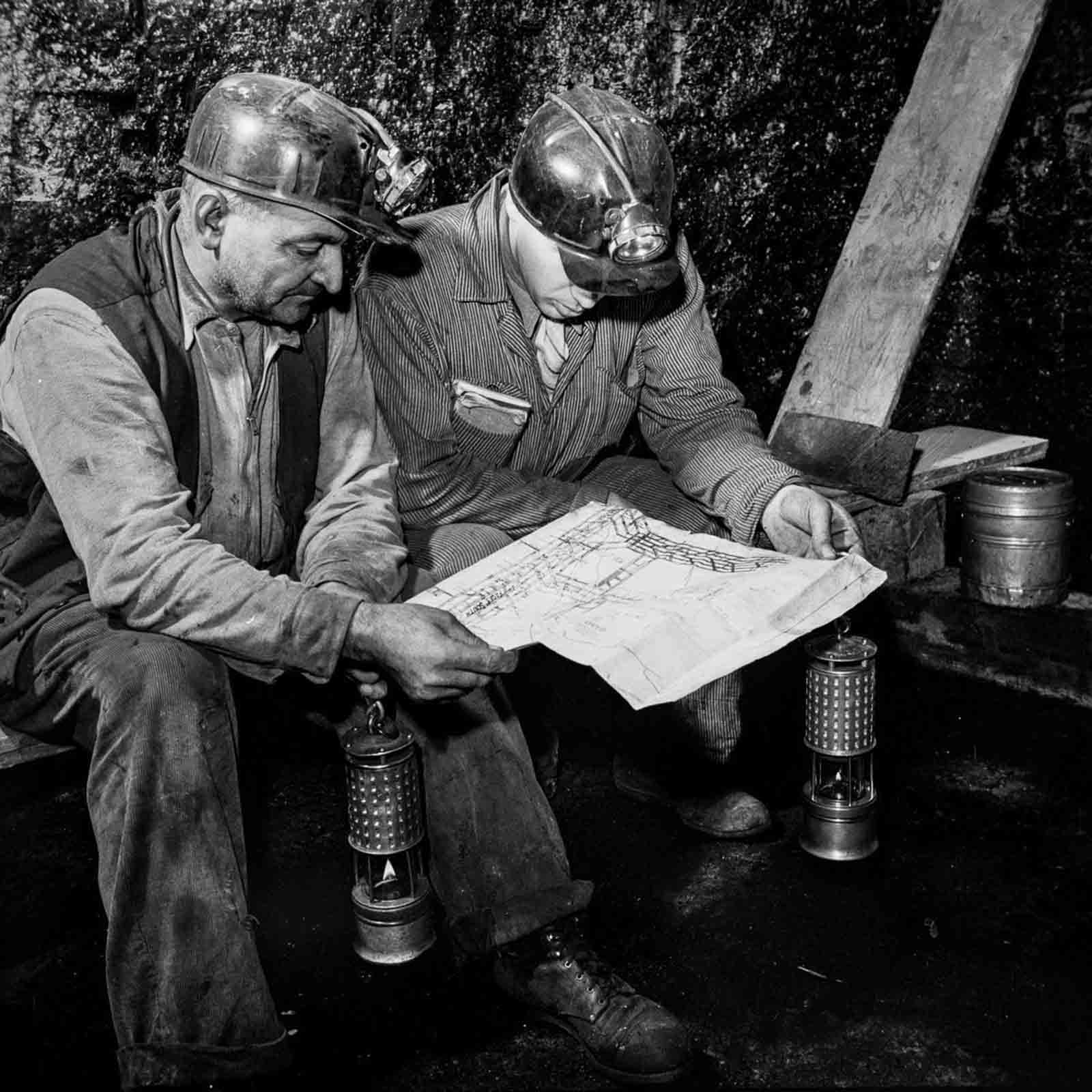 The section foreman and assistant mine superintendent review the day’s work.