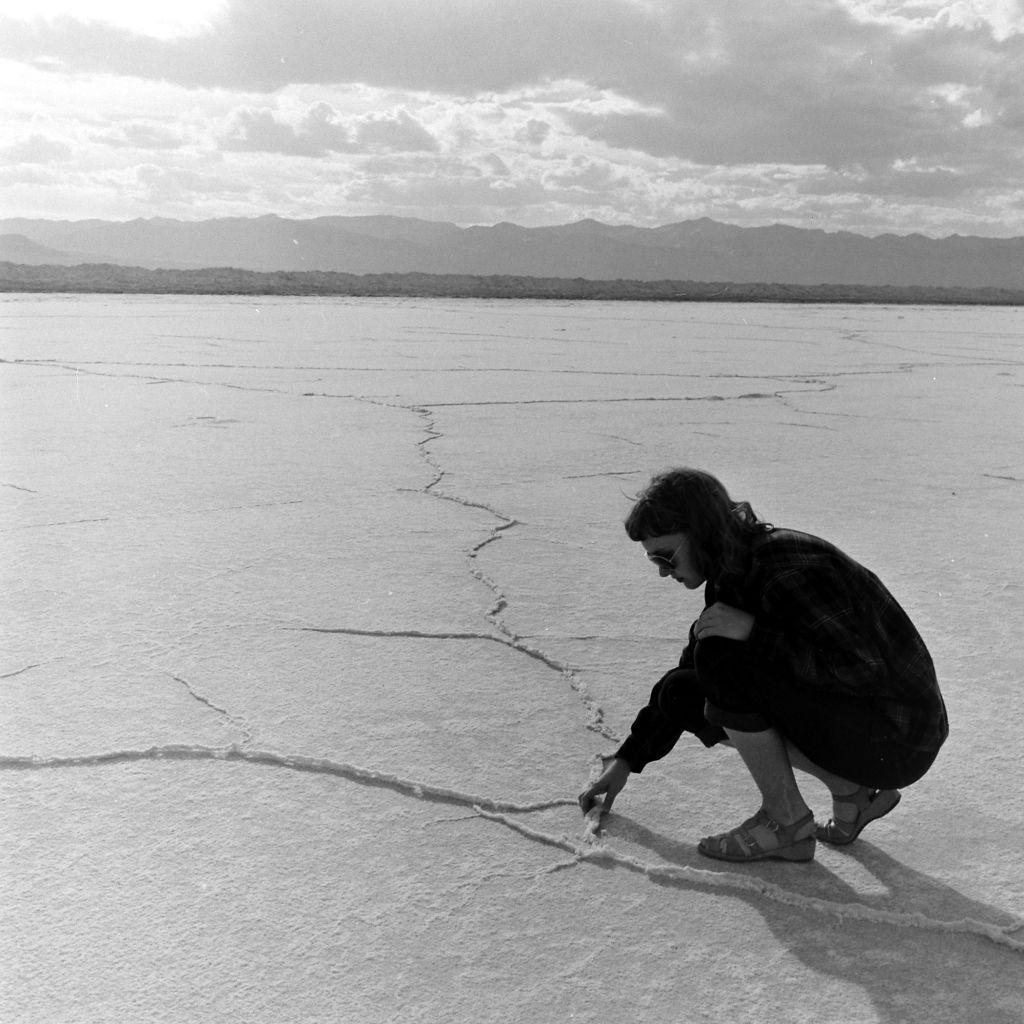 Woman touching Salt Flats at the Great Salt Lake, June 1948.