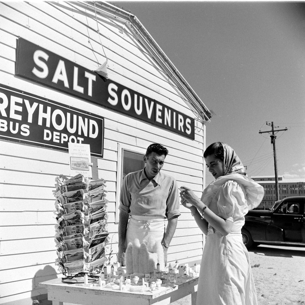 Woman checking the souvenirs at Great Salt Lake, Salt Lake City, June 1948.