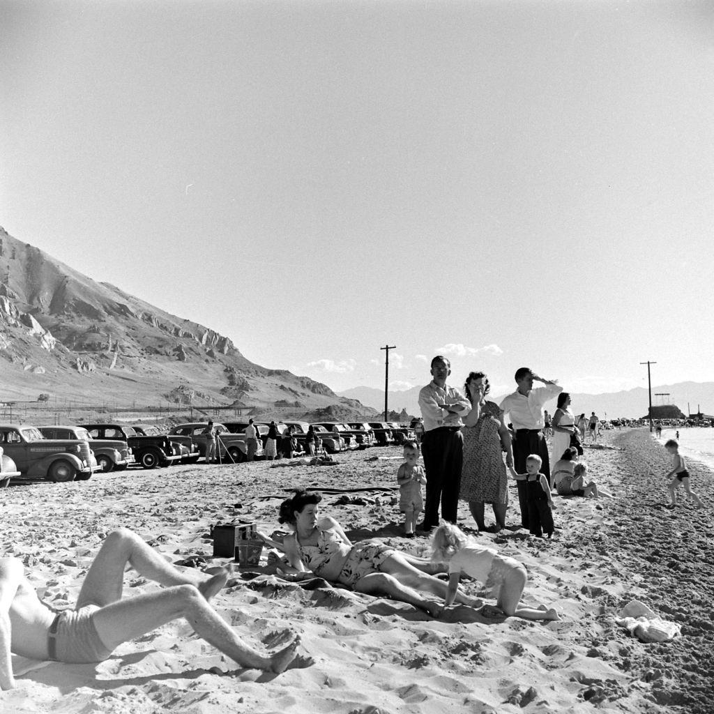 People laying on the seashore, Salt Lake City, June 1948
