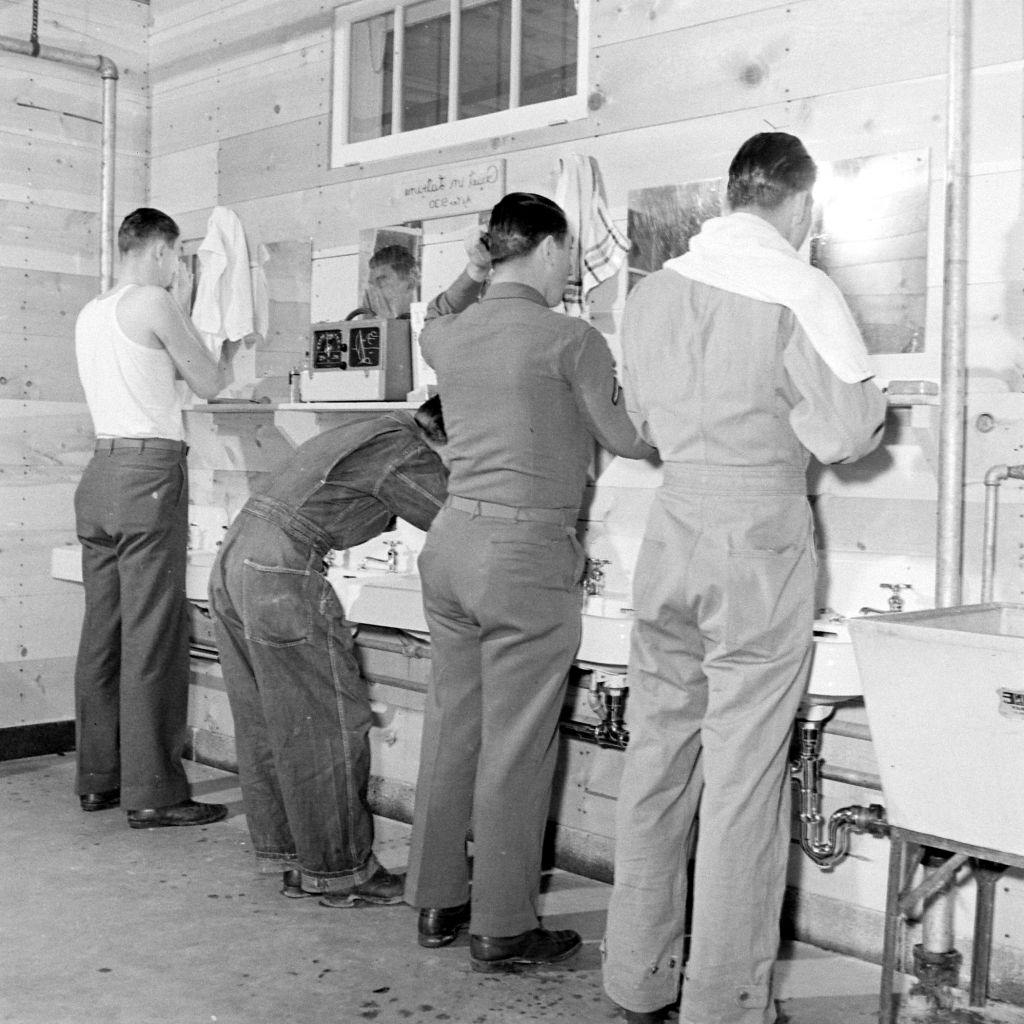 Men in barracks getting ready, Salt Lake City, 1942.