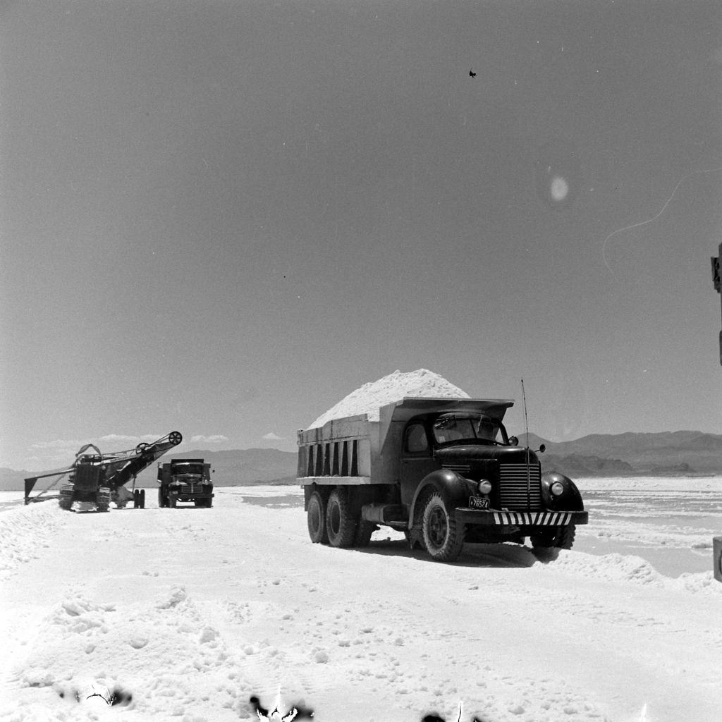 Dump trucks transporting sands of the Great Salt Lake, Salt Lake City, June 1948.