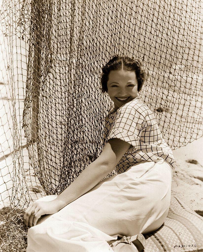 Sylvia Sidney on the beach in front of her Malibu home, 1935.