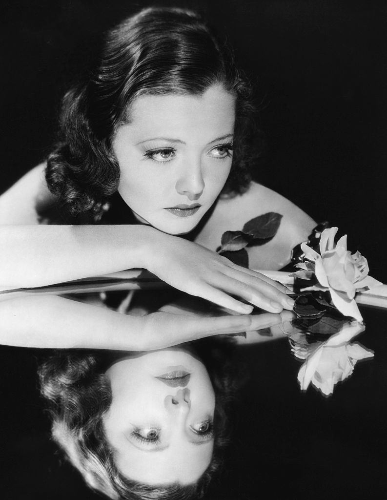 Sylvia Sidney with a rose, 1937.
