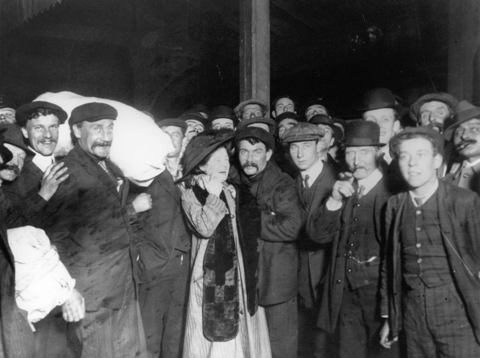 Survivors are greeted by relatives upon their return to Southampton.