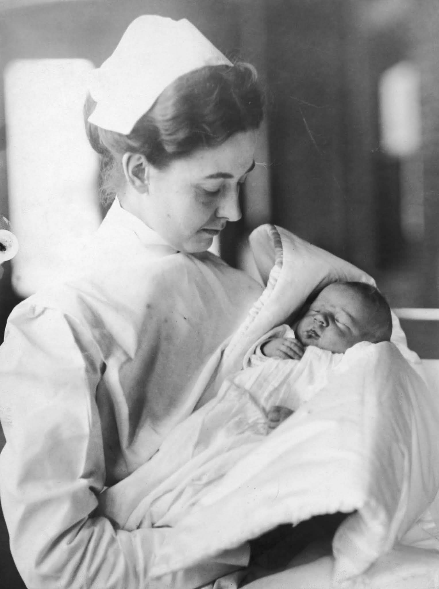 A nurse holds newborn Lucien P. Smith, Jr. His mother Eloise was pregnant with him while returning from her honeymoon aboard the Titanic. Lucien’s father died in the disaster.