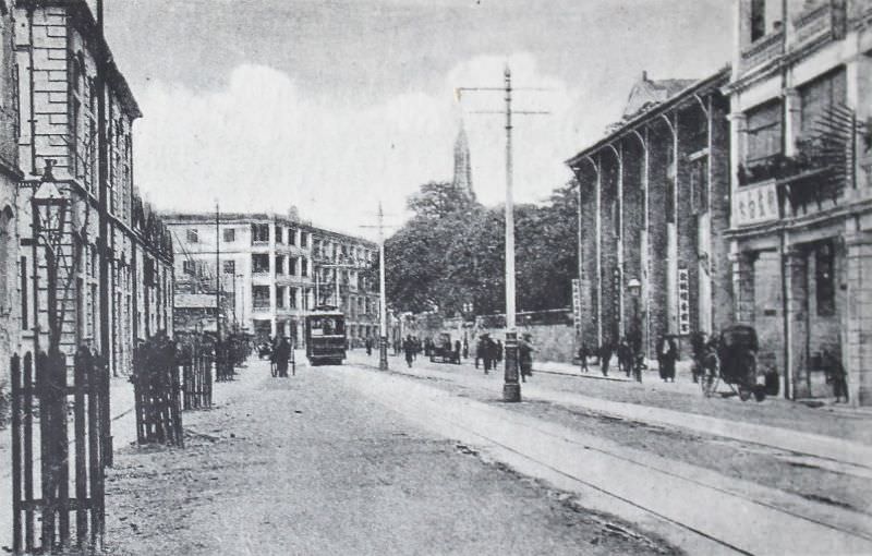 Des 'Voeux Road and electric car, sailor's home and St. Peter's Church