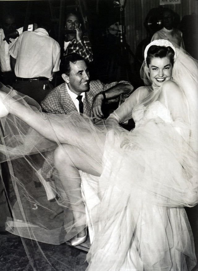 Esther Williams poses in a wedding dress, 1952