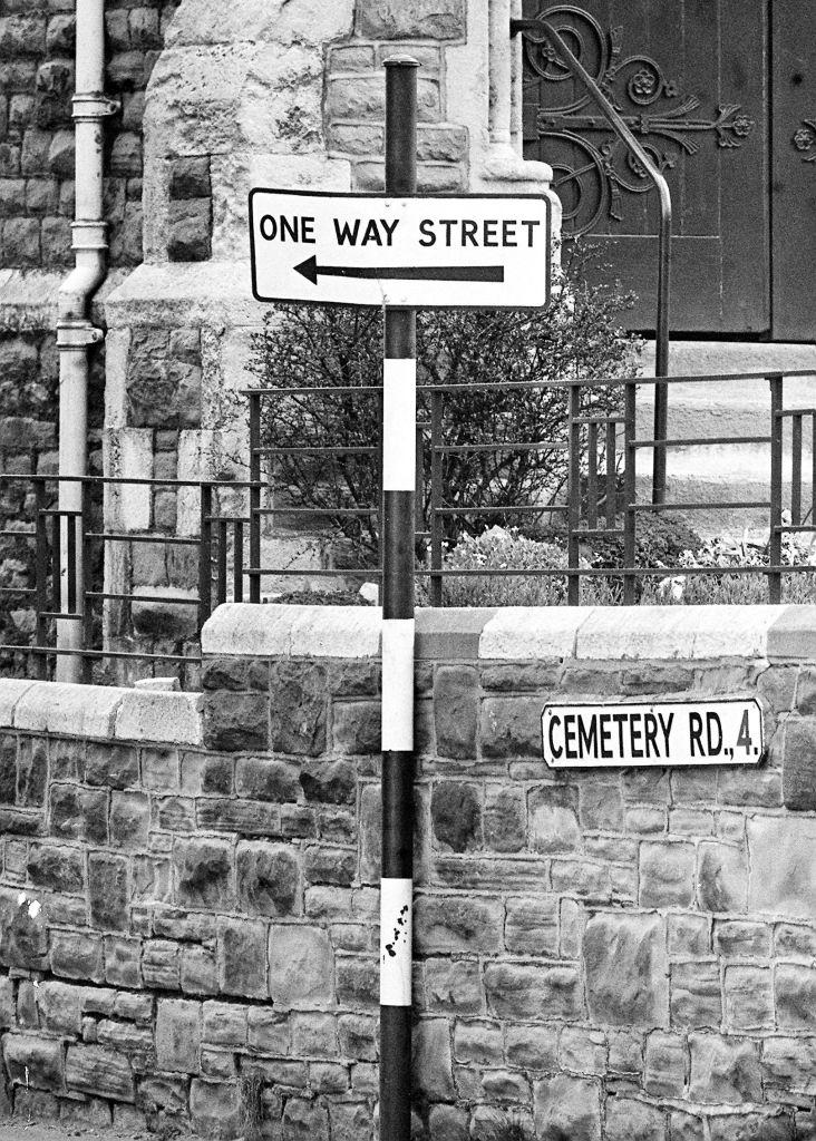 The point of no return is marked by a road name plate and a traffic sign in the Arno's Vale area of Bristol.