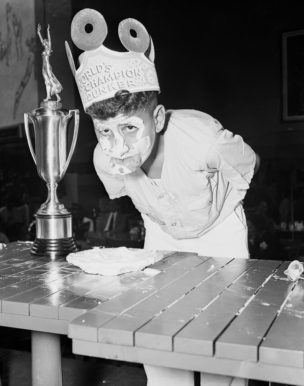 Joseph Rubolotta, 12, is crowned world champion doughnut dunker at a competition in New York, 1939.