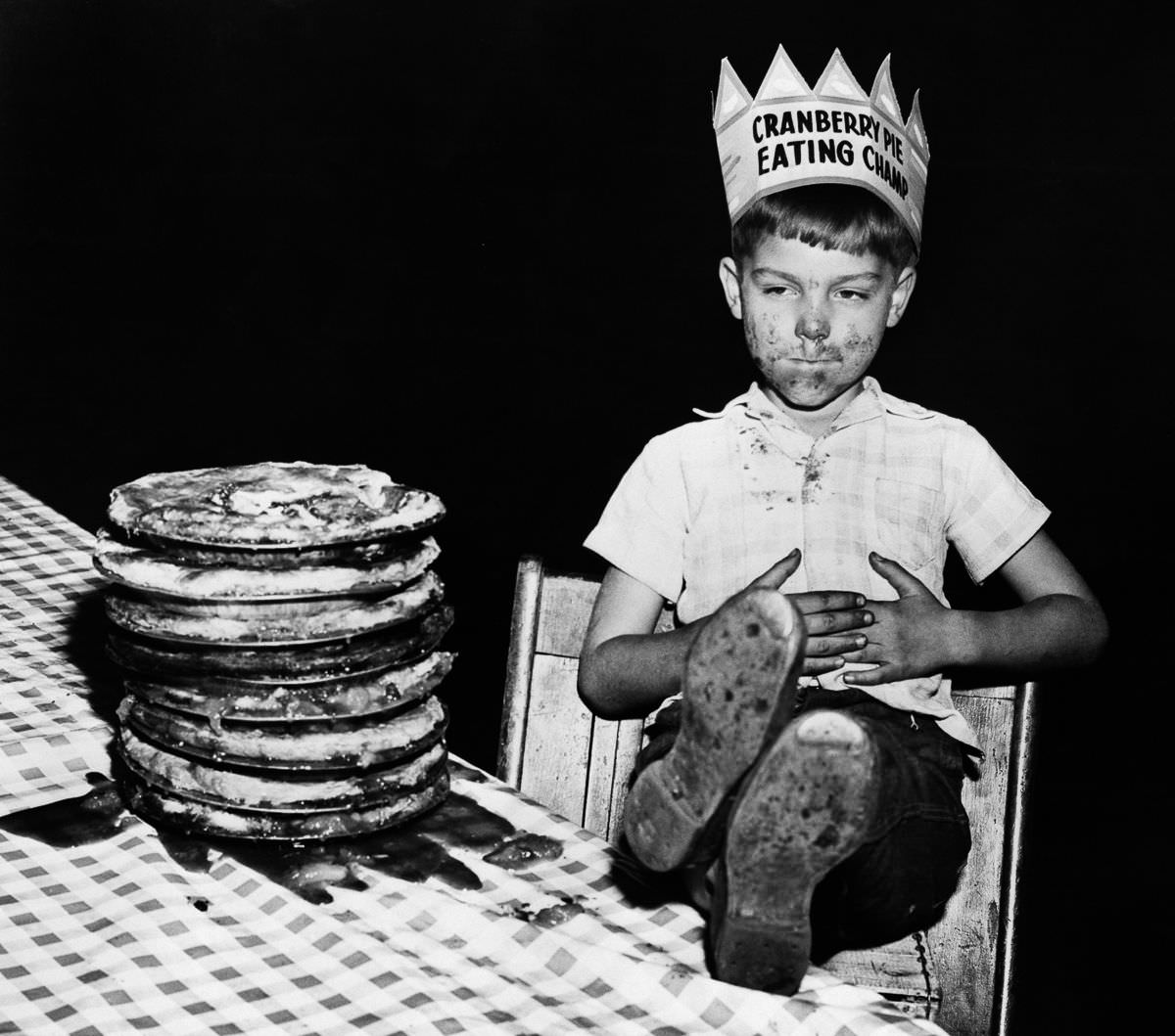 Richard Baranski, 6, savors his victory after eating a 10-inch cranberry pie in 15 seconds, 1948.