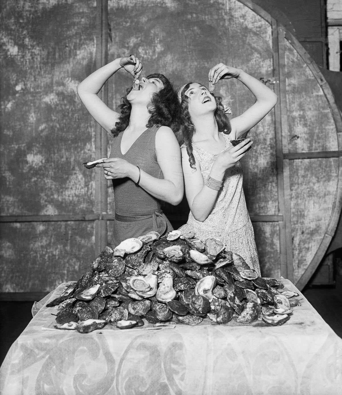 Lois and Ruth Waddell devour a combined total of 204 oysters in 1920.